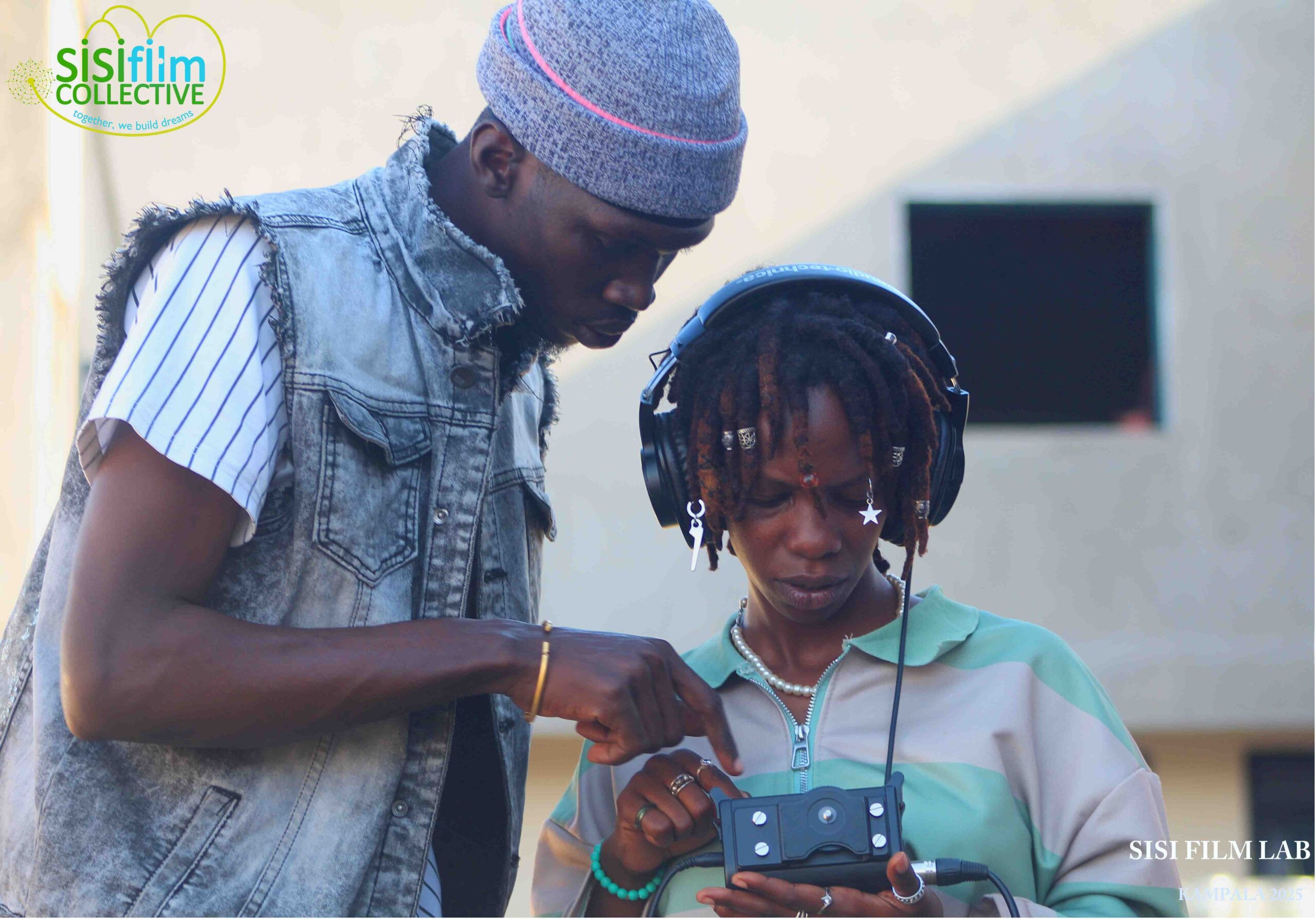 Sound experts operating the Tascam.